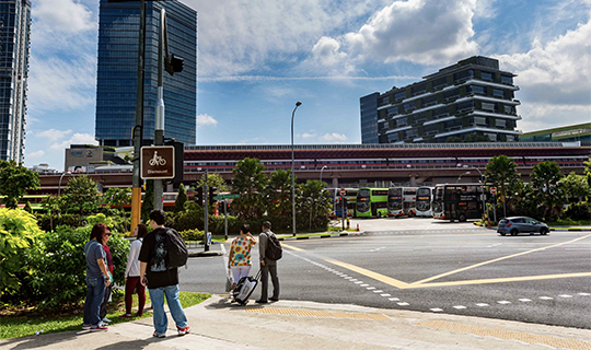 Pedestrians waiting at a traffic junction