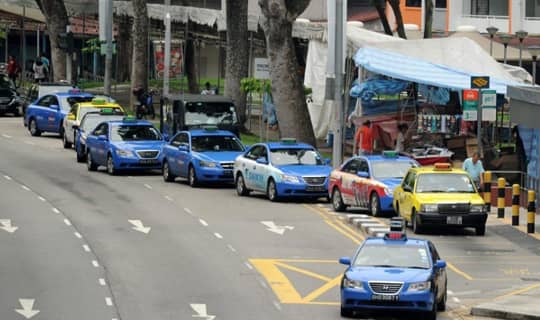 Taxis queuing up at a taxi stand