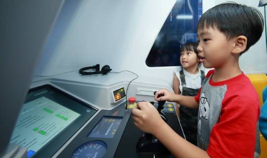 Image of children with a train stimulator
