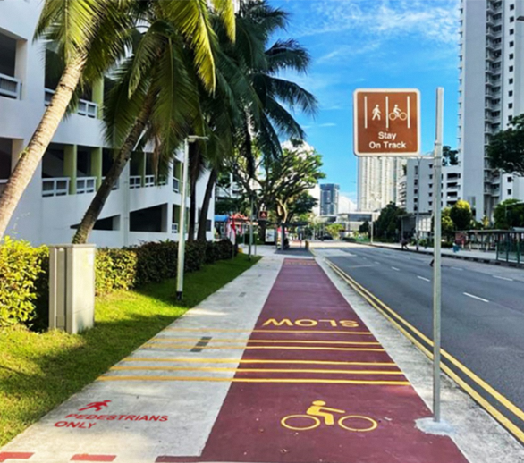 Pedestrians-Only and cyclist logos along a Pedestrian-Only Path and dedicated cycling path. 