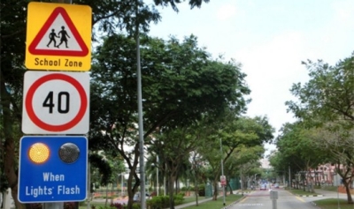 40km/h When Lights Flash signage at a School Zone
