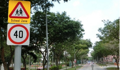 40km/h When Lights Flash signage at a School Zone