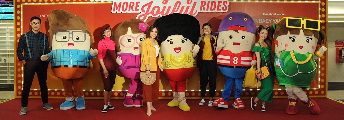 The thoughtful bunch mascots with persons dressed up as them