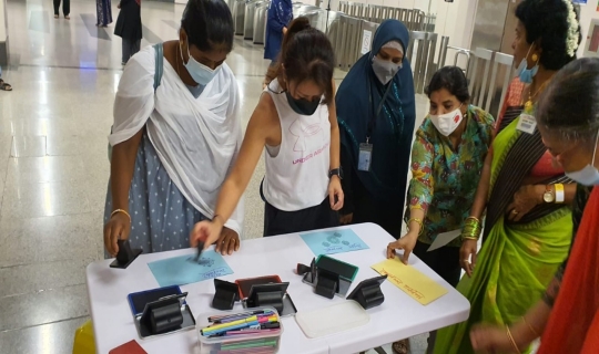 Rangoli-making activity led by a community artist, Mrs Vijaya Mohan