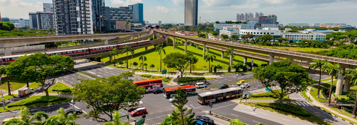 This is an image of land transport in Singapore featuring trains, bus and roads