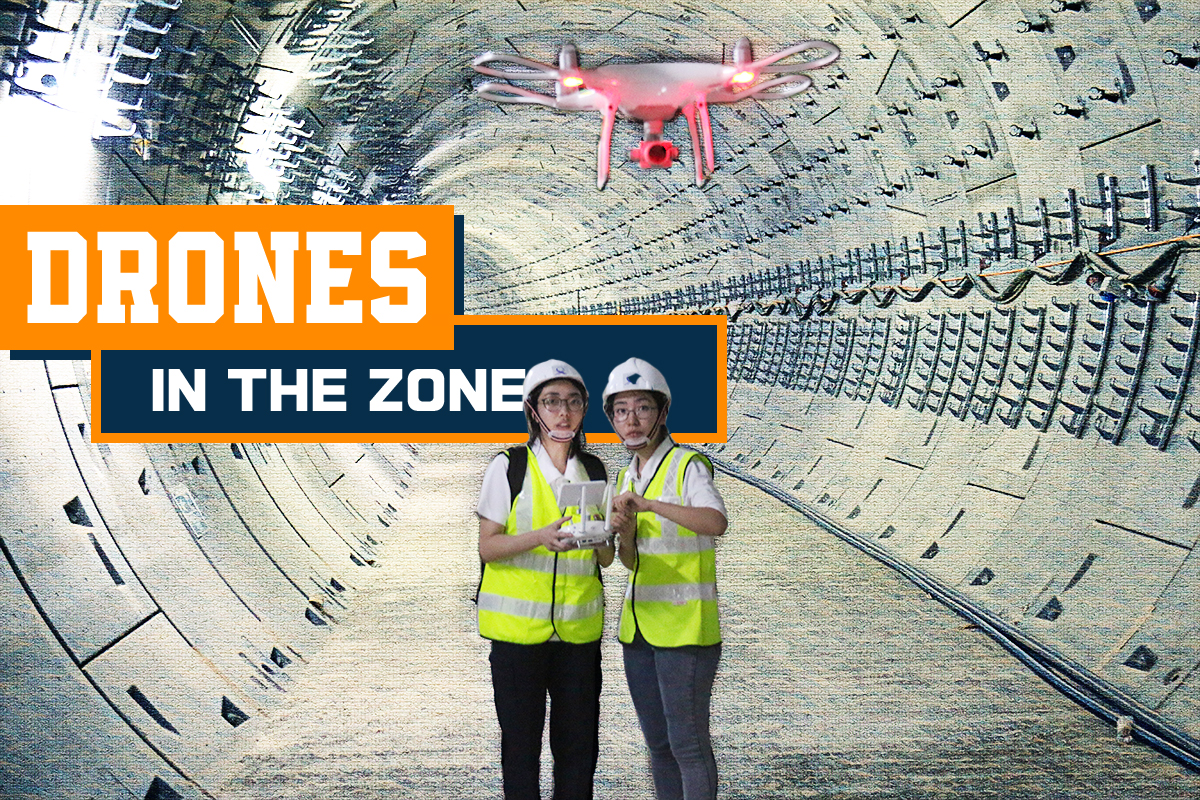Hero Image of Drone Task Force members with drone in tunnel